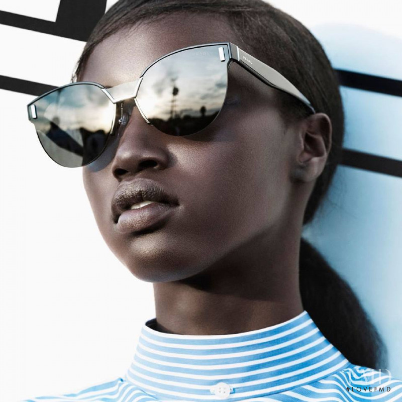 Anok Yai featured in  the Prada Eyewear advertisement for Spring/Summer 2018