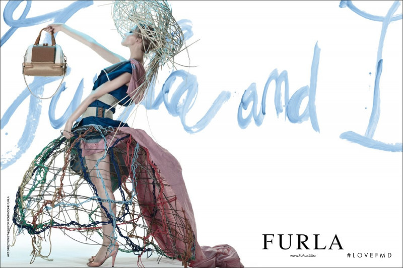 Sasha Luss featured in  the Furla advertisement for Spring/Summer 2012