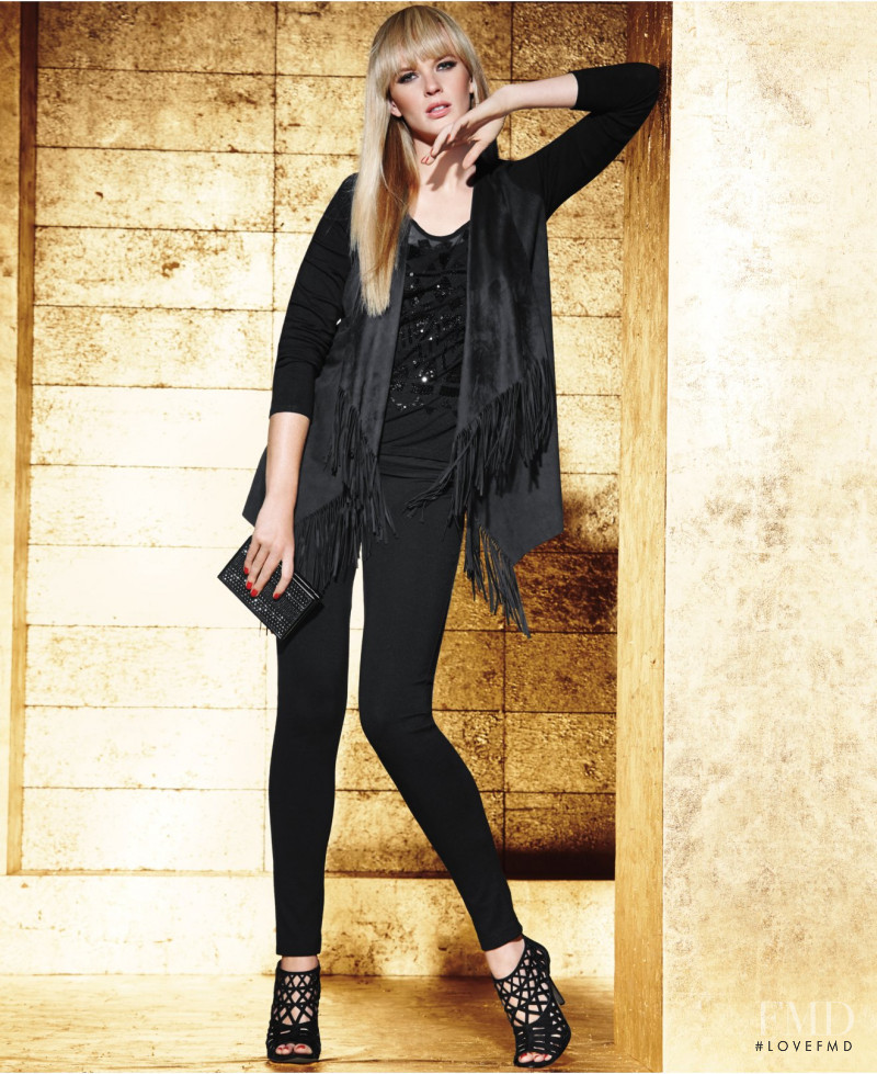 Anne Vyalitsyna featured in  the Macy\'s I.N.C. International Concepts catalogue for Holiday 2015