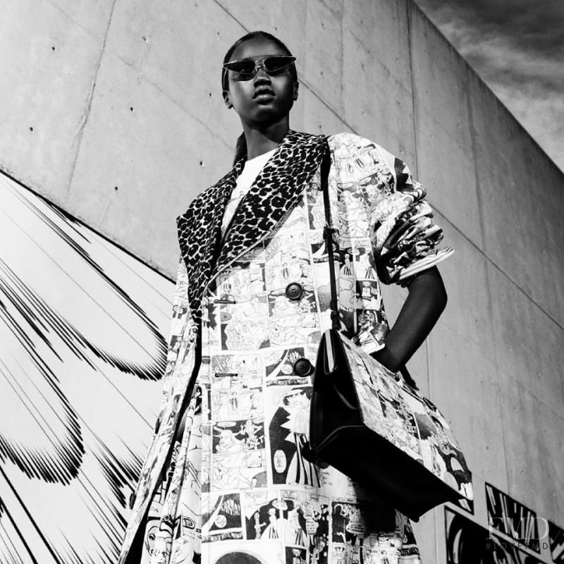 Anok Yai featured in  the Prada Real Life Comix  advertisement for Spring/Summer 2018