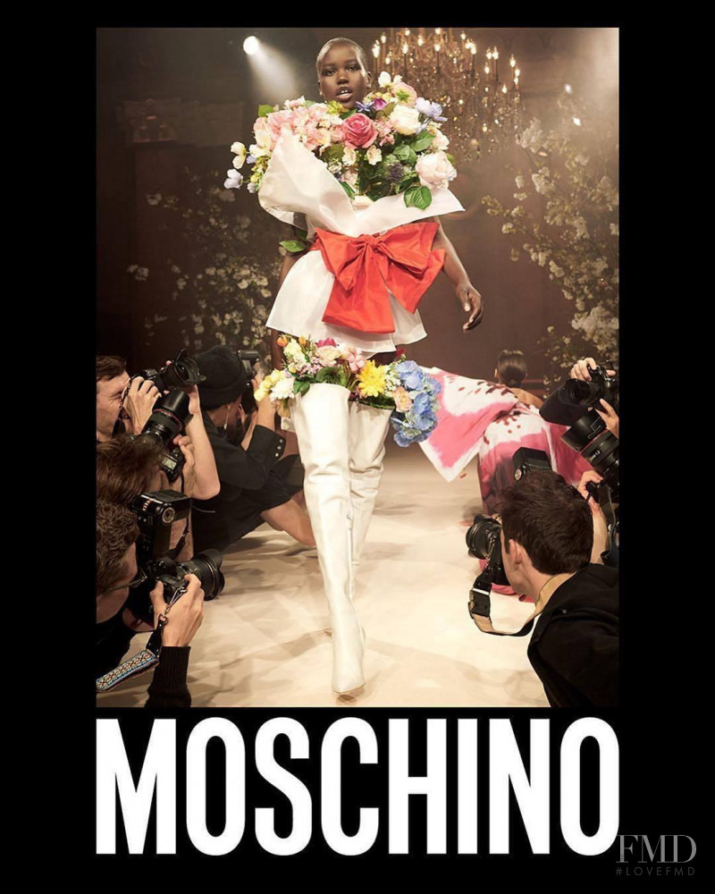 Adut Akech Bior featured in  the Moschino advertisement for Spring/Summer 2018