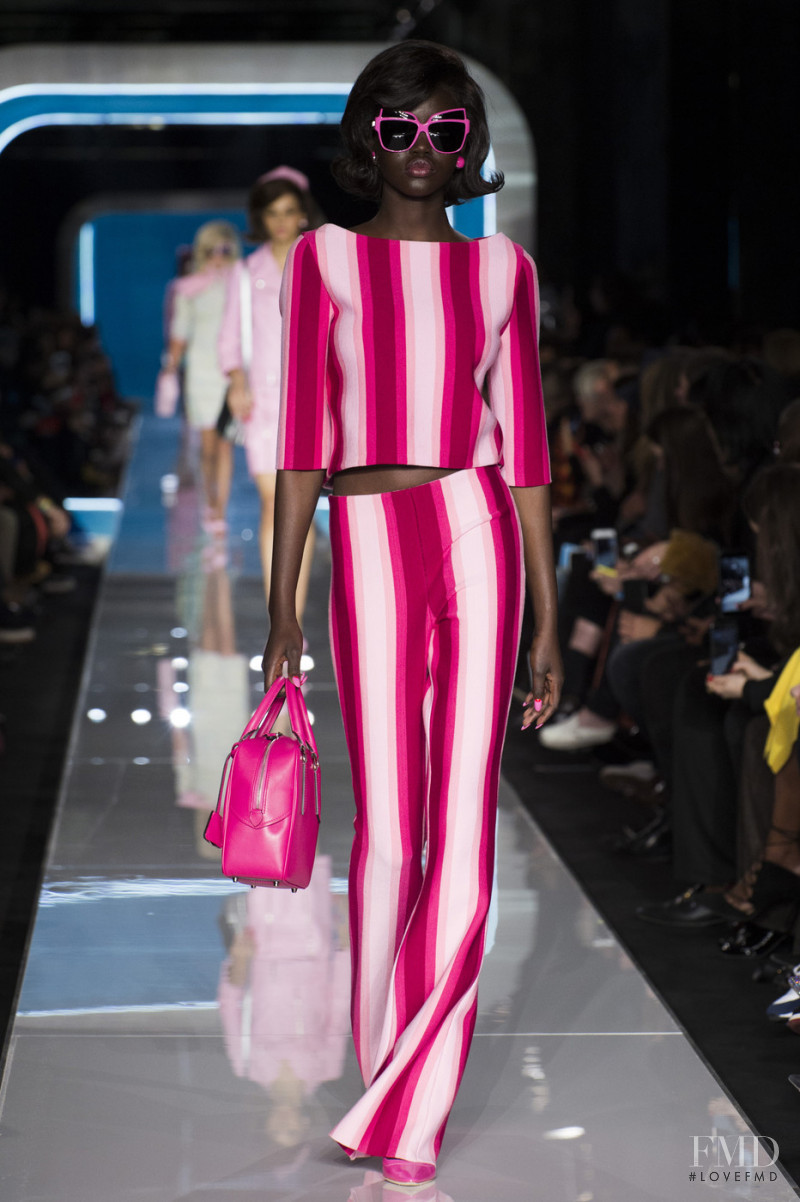 Adut Akech Bior featured in  the Moschino fashion show for Autumn/Winter 2018