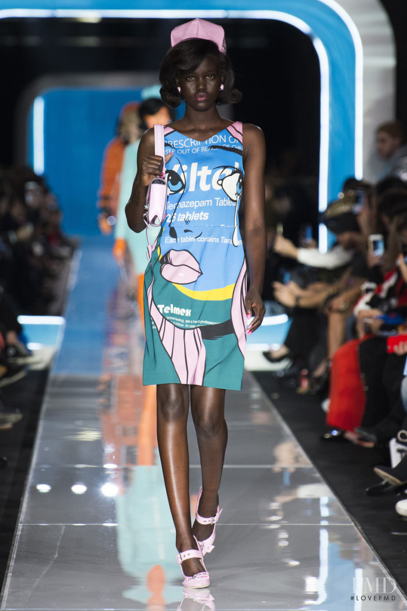 Adut Akech Bior featured in  the Moschino fashion show for Autumn/Winter 2018