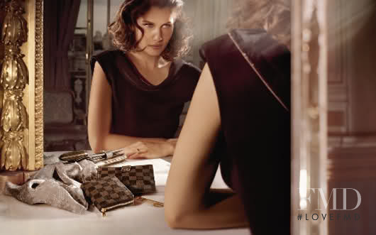 Laetitia Casta featured in  the Louis Vuitton "Core Values" Handbags advertisement for Autumn/Winter 2008