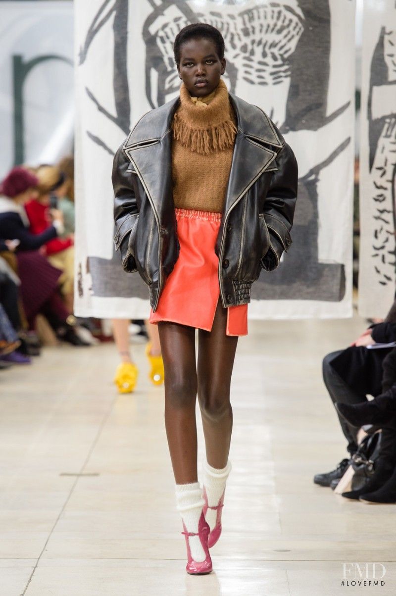 Adut Akech Bior featured in  the Miu Miu fashion show for Autumn/Winter 2018