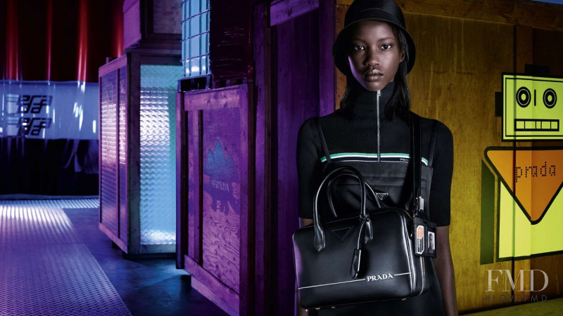 Anok Yai featured in  the Prada Industreality advertisement for Pre-Fall 2018