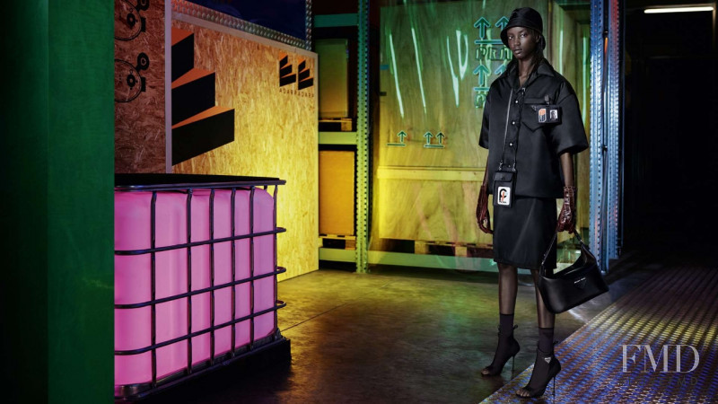 Anok Yai featured in  the Prada Industreality advertisement for Pre-Fall 2018