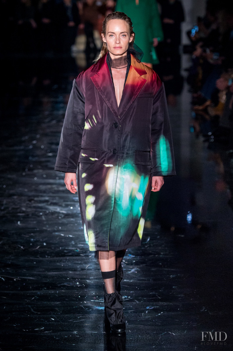 Amber Valletta featured in  the Prada fashion show for Autumn/Winter 2018