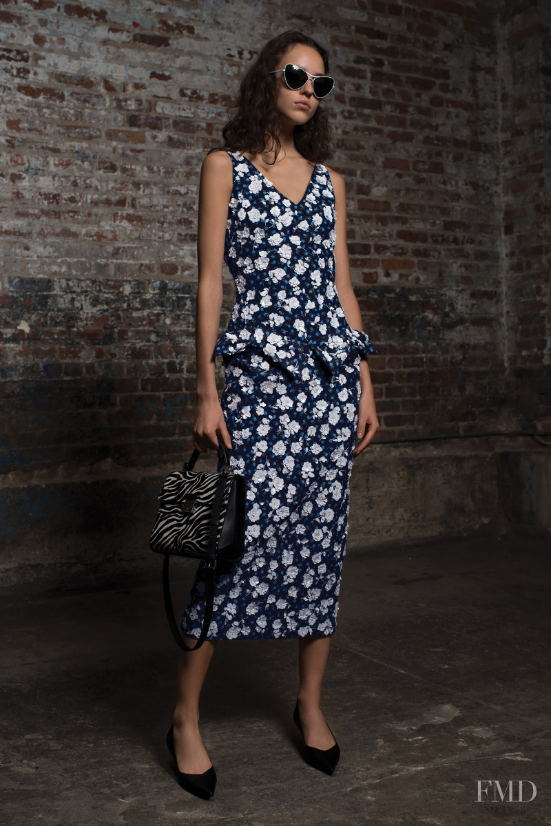 Emm Arruda featured in  the Michael Kors Collection lookbook for Pre-Fall 2018