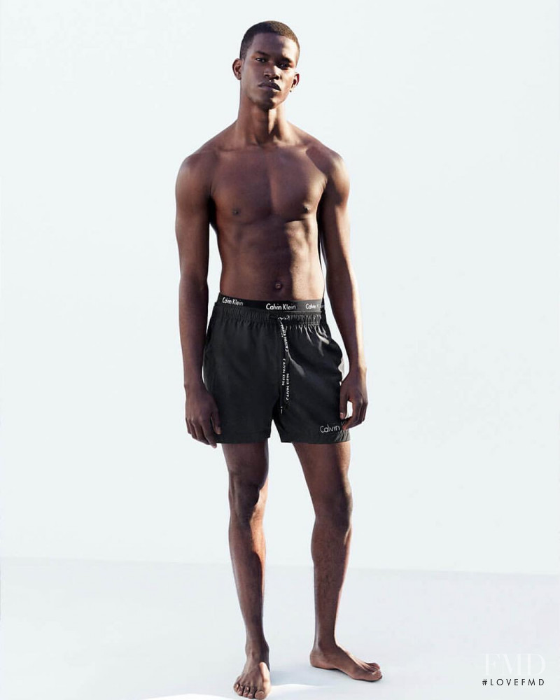 Salomon Diaz featured in  the Calvin Klein Swimwear advertisement for Spring/Summer 2018
