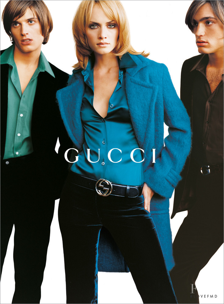 Amber Valletta featured in  the Gucci advertisement for Autumn/Winter 1995