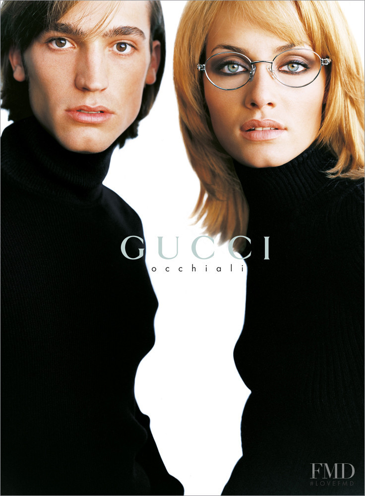 Amber Valletta featured in  the Gucci advertisement for Autumn/Winter 1995