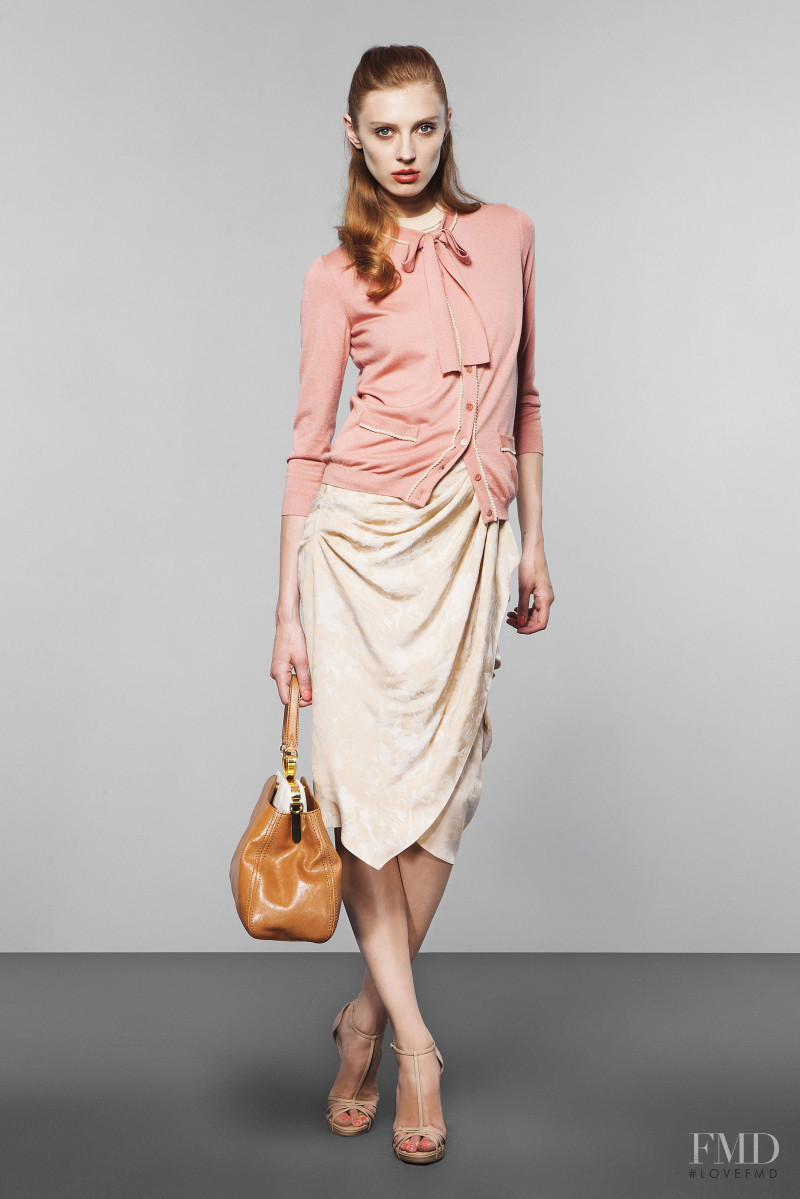 Olga Sherer featured in  the Moschino lookbook for Resort 2011