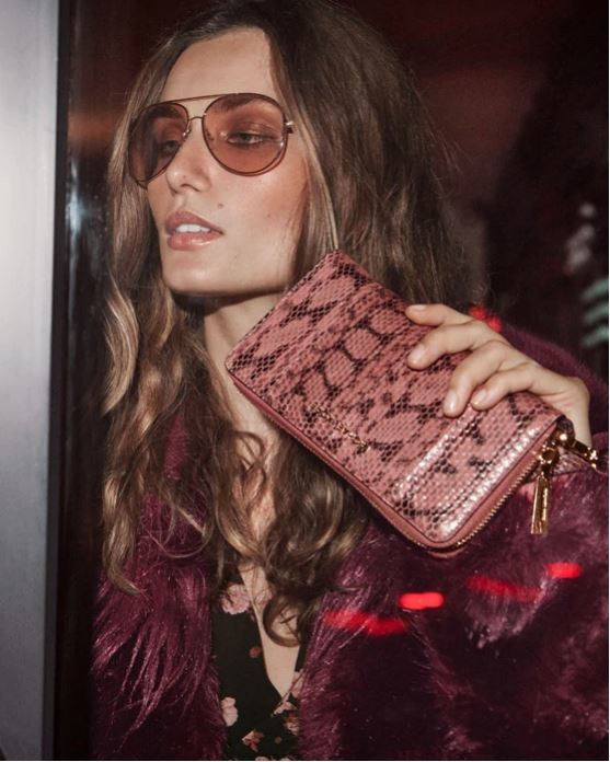 Andreea Diaconu featured in  the Michael Kors Collection Holiday advertisement for Holiday 2018