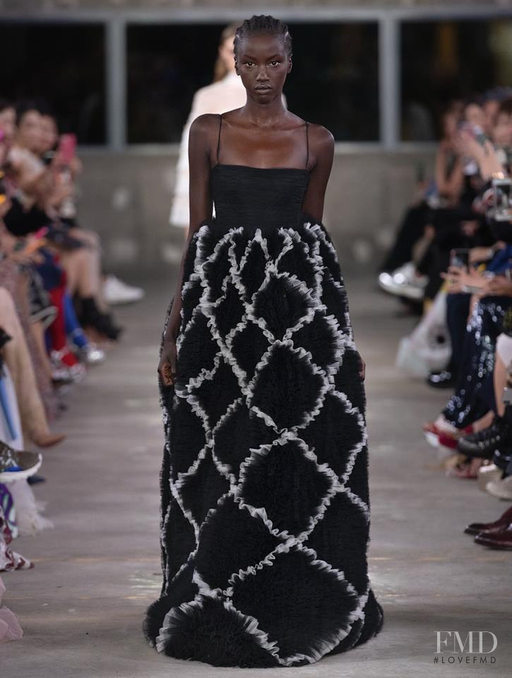 Anok Yai featured in  the Valentino fashion show for Pre-Fall 2019