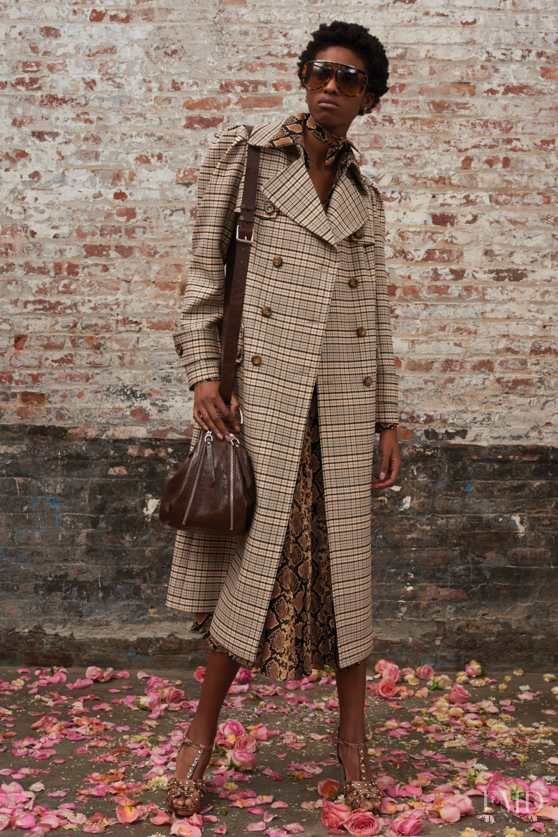 Kathia Nseke featured in  the Michael Kors Collection lookbook for Pre-Fall 2019