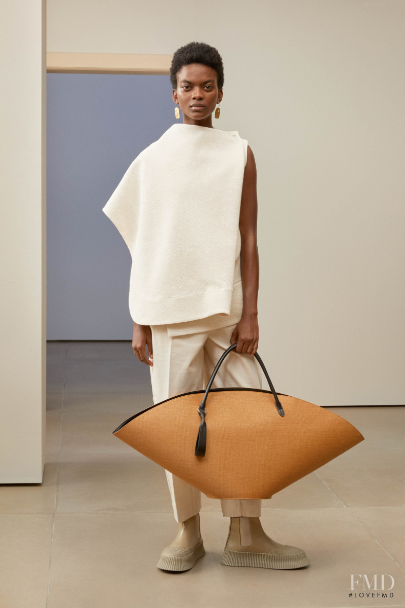 Aube Jolicoeur featured in  the Jil Sander lookbook for Pre-Fall 2019