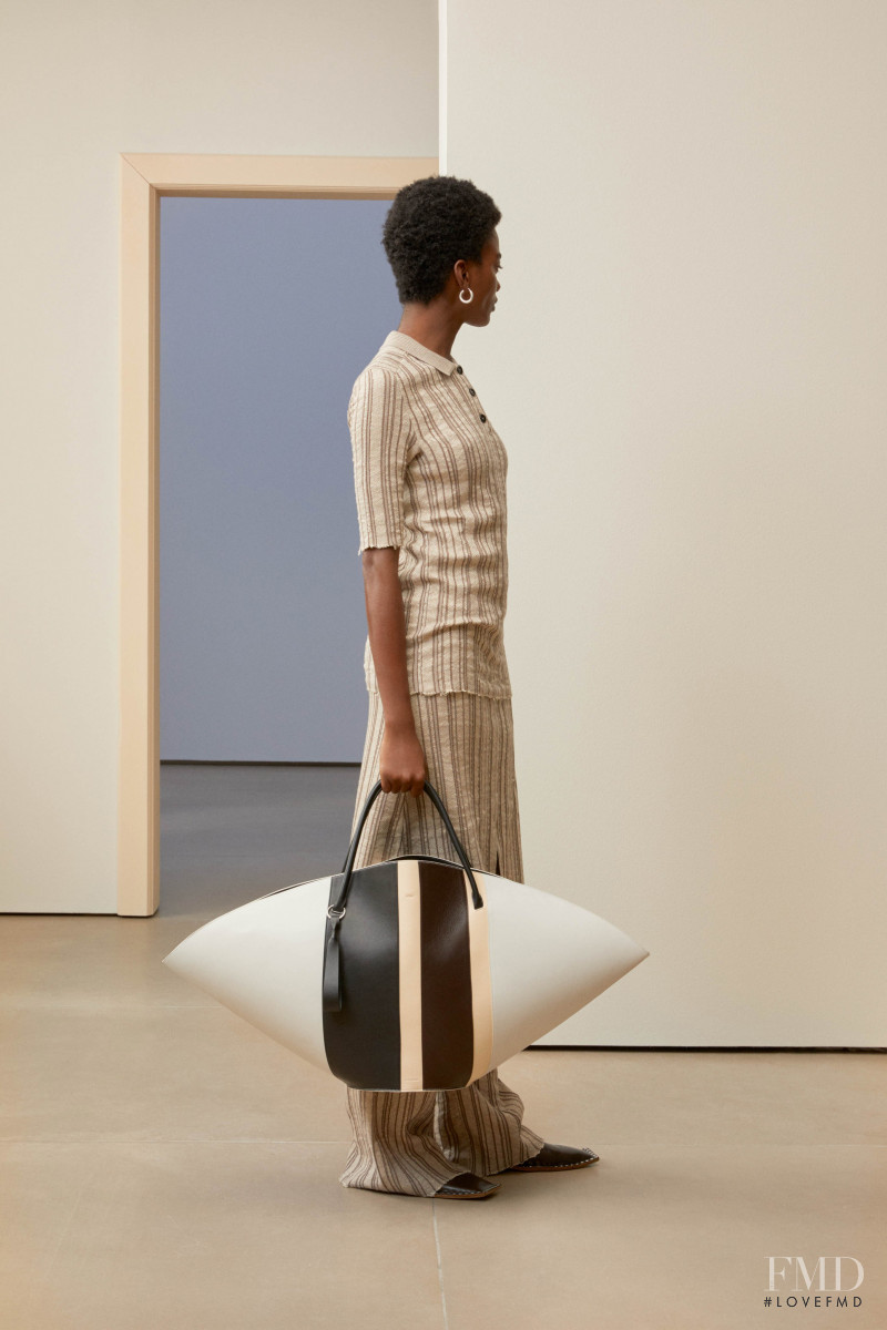 Aube Jolicoeur featured in  the Jil Sander lookbook for Pre-Fall 2019