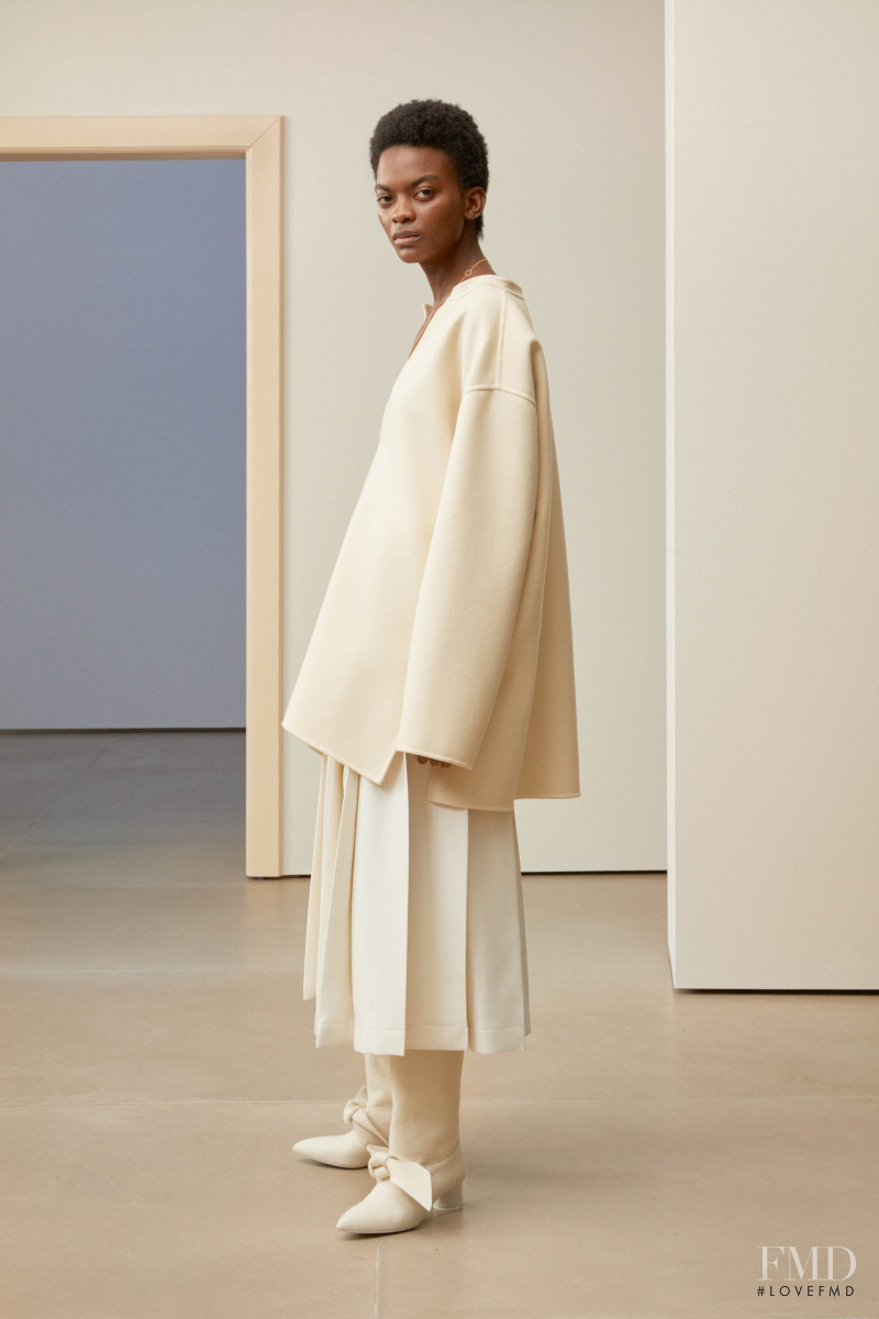 Aube Jolicoeur featured in  the Jil Sander lookbook for Pre-Fall 2019