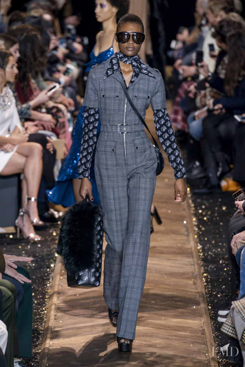 Naki Depass featured in  the Michael Kors Collection fashion show for Autumn/Winter 2019