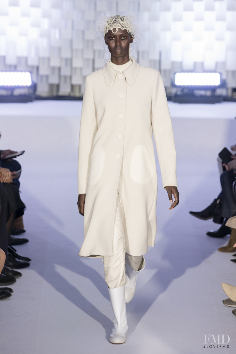 Nyarach Abouch Ayuel Aboja featured in  the André Courrèges fashion show for Autumn/Winter 2019