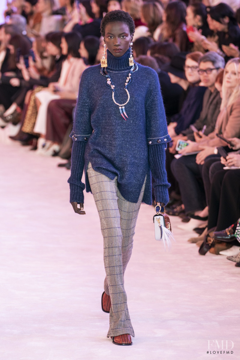 Anok Yai featured in  the Chloe fashion show for Autumn/Winter 2019