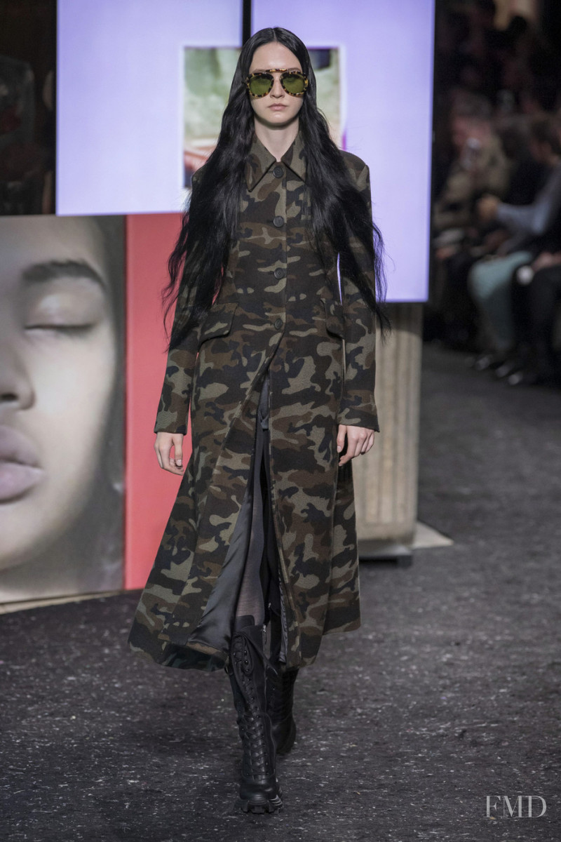 Polina Zavialova featured in  the Miu Miu fashion show for Autumn/Winter 2019