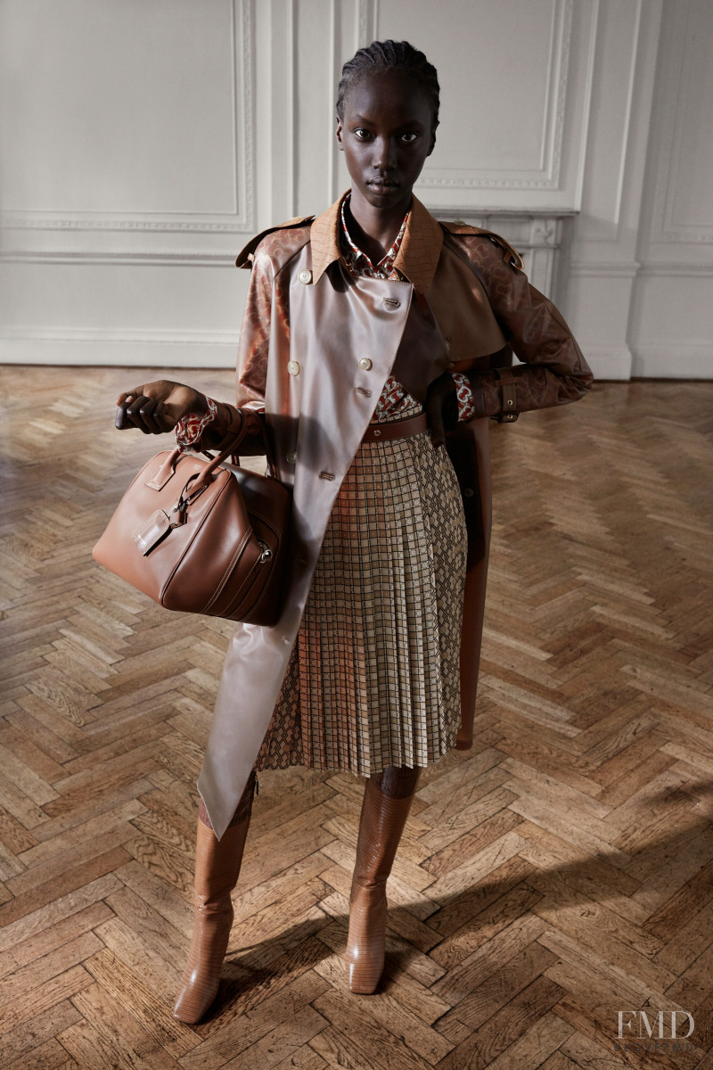 Anok Yai featured in  the Burberry lookbook for Pre-Fall 2019
