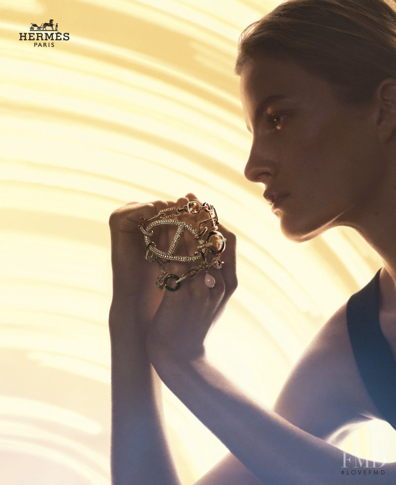 Felice Noordhoff featured in  the Hermès Artisans of Enlightenment Jewelry Campaign advertisement for Summer 2019