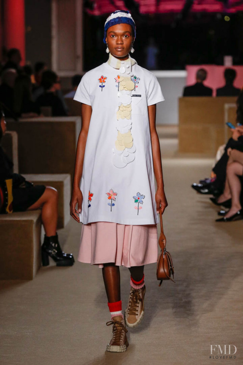 Naki Depass featured in  the Prada fashion show for Resort 2020