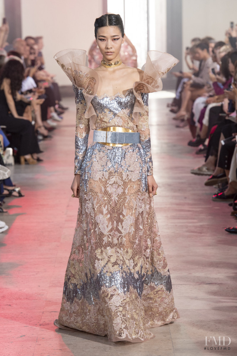 Rui Nan Dong featured in  the Elie Saab Couture fashion show for Autumn/Winter 2019