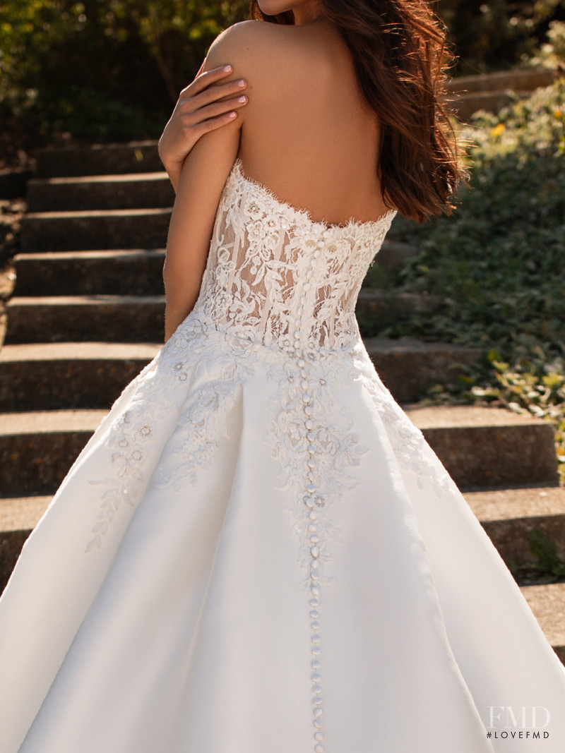 Zhenya Katava featured in  the Pronovias catalogue for Summer 2019