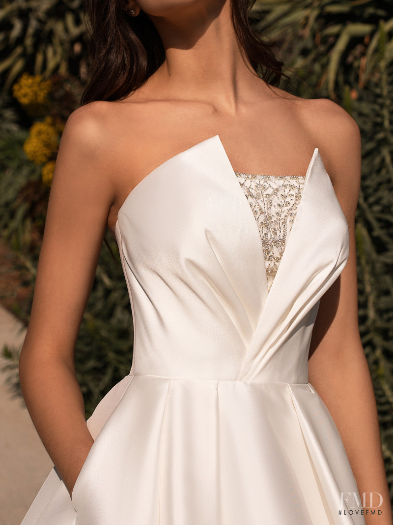 Zhenya Katava featured in  the Pronovias catalogue for Summer 2019