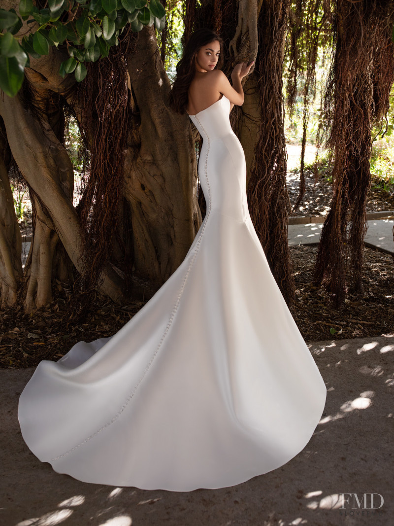 Zhenya Katava featured in  the Pronovias catalogue for Summer 2019