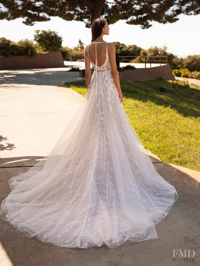 Zhenya Katava featured in  the Pronovias catalogue for Summer 2019