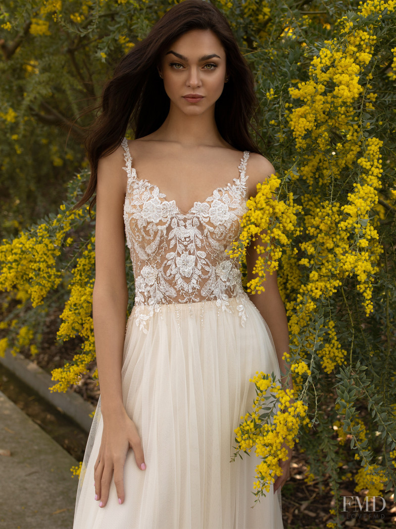 Zhenya Katava featured in  the Pronovias catalogue for Summer 2019