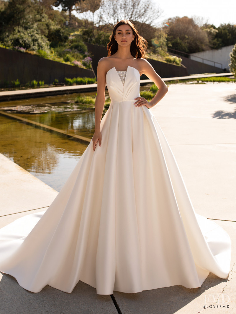 Zhenya Katava featured in  the Pronovias catalogue for Summer 2019