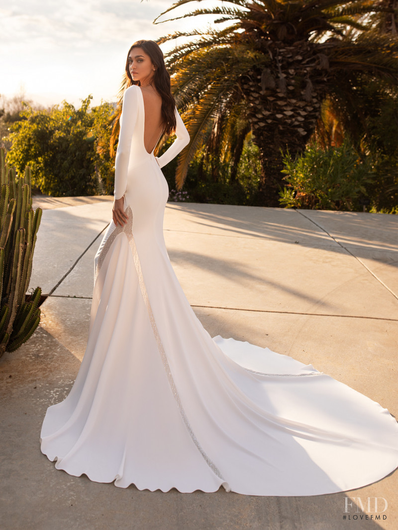 Zhenya Katava featured in  the Pronovias catalogue for Summer 2019