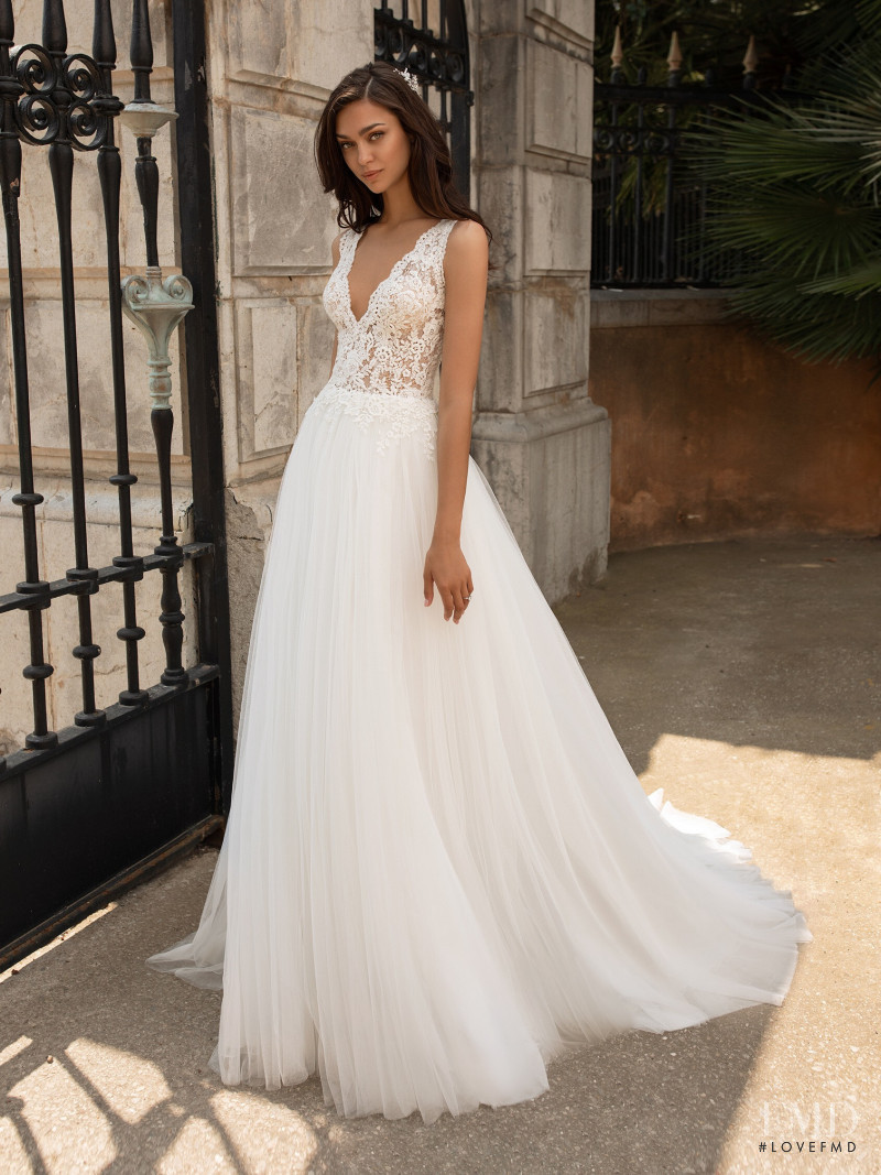 Zhenya Katava featured in  the Pronovias catalogue for Summer 2019