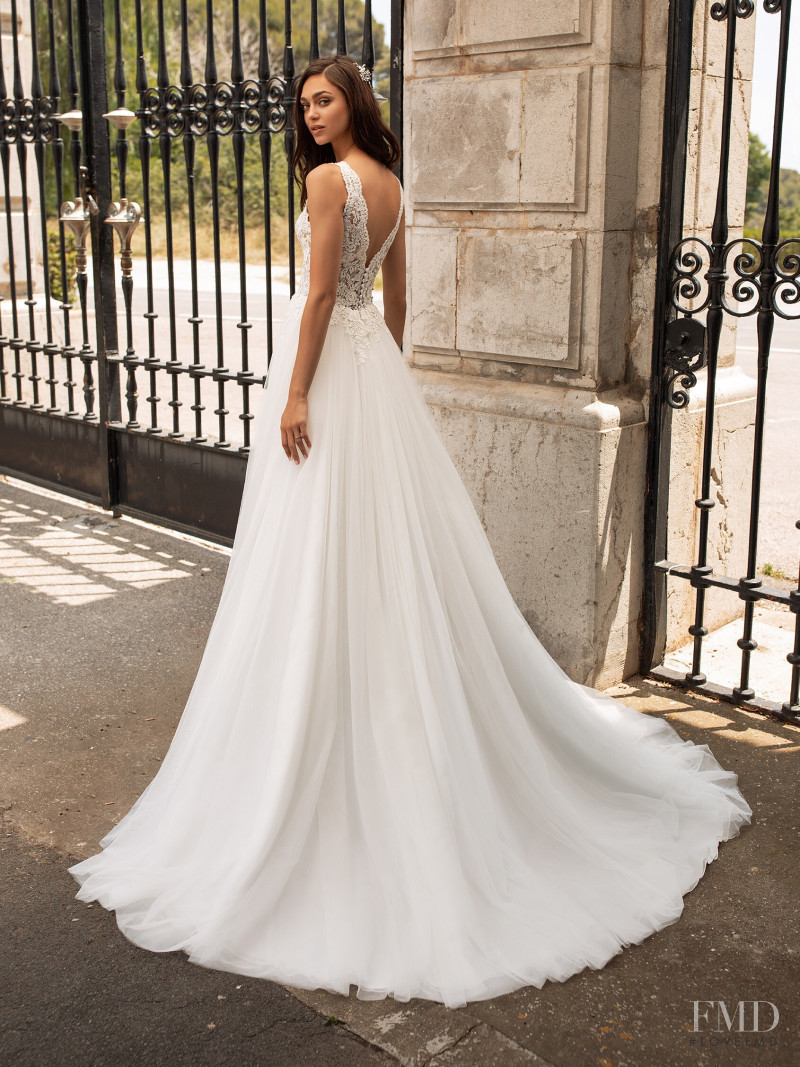 Zhenya Katava featured in  the Pronovias catalogue for Summer 2019