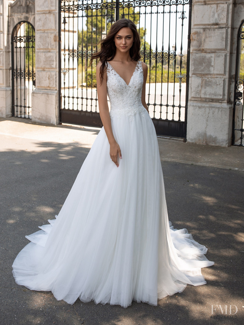 Zhenya Katava featured in  the Pronovias catalogue for Summer 2019