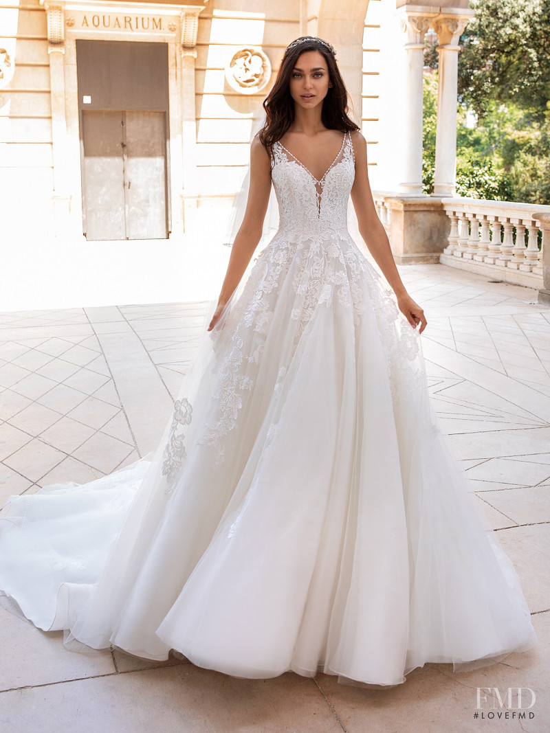 Zhenya Katava featured in  the Pronovias catalogue for Summer 2019