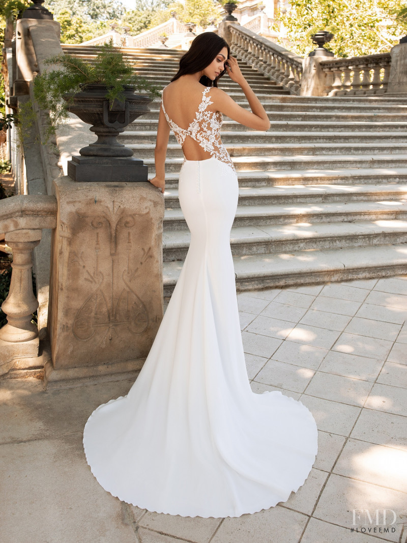 Zhenya Katava featured in  the Pronovias catalogue for Summer 2019