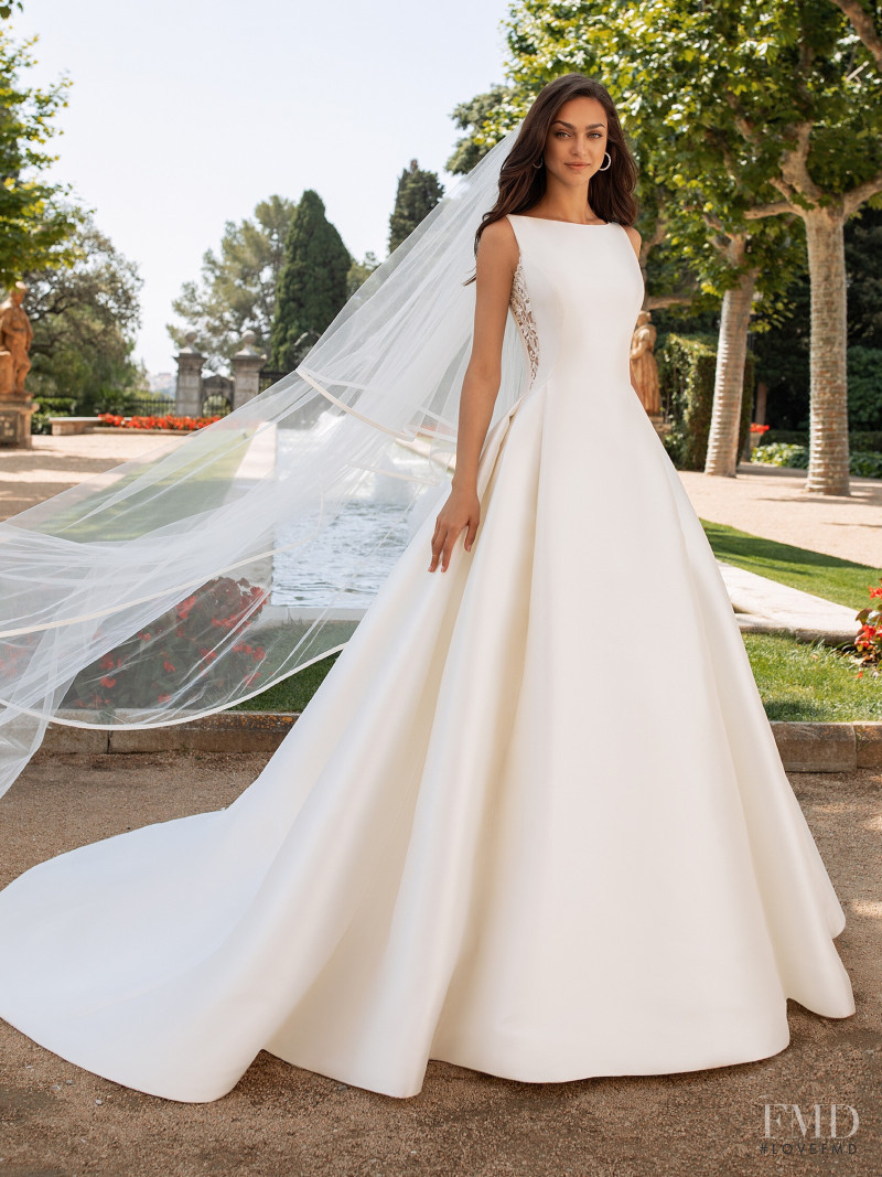 Zhenya Katava featured in  the Pronovias catalogue for Summer 2019