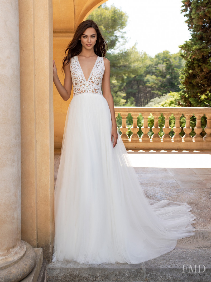 Zhenya Katava featured in  the Pronovias catalogue for Summer 2019