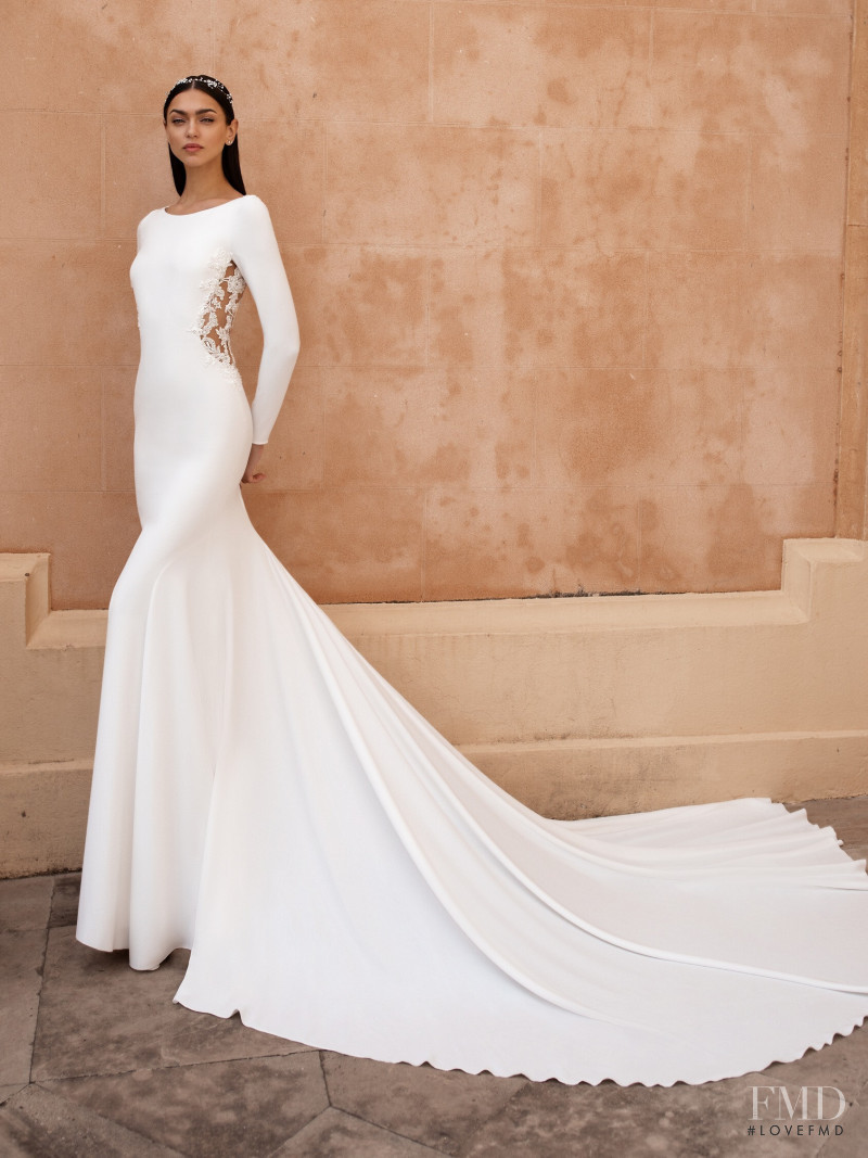 Zhenya Katava featured in  the Pronovias catalogue for Summer 2019