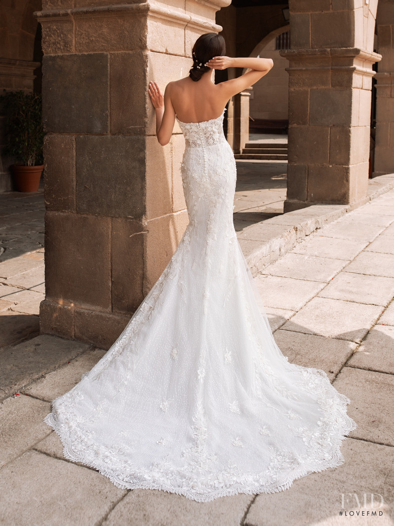 Zhenya Katava featured in  the Pronovias catalogue for Summer 2019