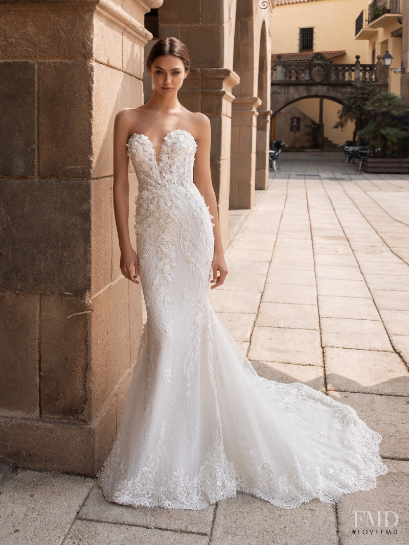 Zhenya Katava featured in  the Pronovias catalogue for Summer 2019