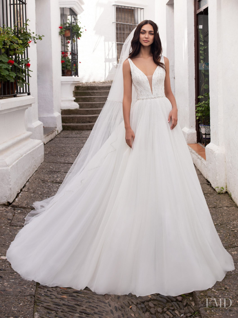 Zhenya Katava featured in  the Pronovias catalogue for Summer 2019