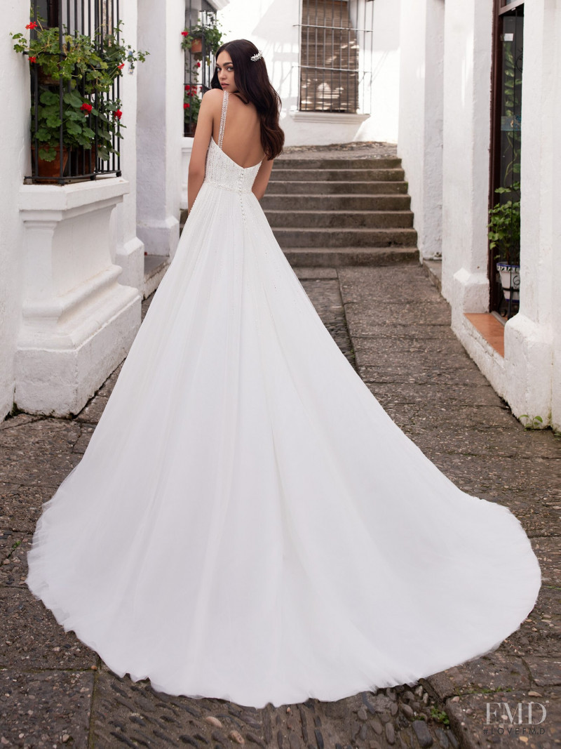 Zhenya Katava featured in  the Pronovias catalogue for Summer 2019